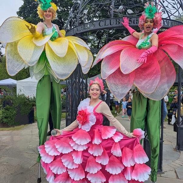 Flower-girls-on-stilts